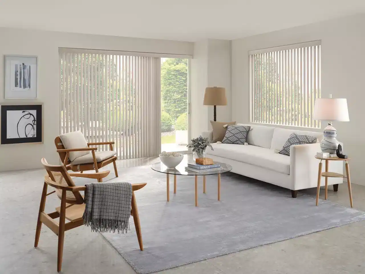 Bright, airy, minimalist interior with natural light, comfortable seating, and contemporary design.